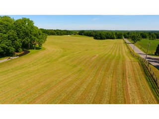 TRACT 4 WITH 3 IN BACKGROUND - REAL ESTATE AUCTION - 2 PRESTIGUOUS HOMES - 66+/- ACRES IN 5 TRACTS IN NOBLE COUNTY, INDIANA
